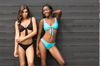 ISKKA's Gabrielle low rise bikini bottoms are self lining without tight seams around our hips. Best fitting bottoms. Seen here in black and light blue with our matching Suzie Sailor tops.
